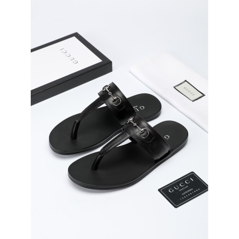 G*u*i slippers